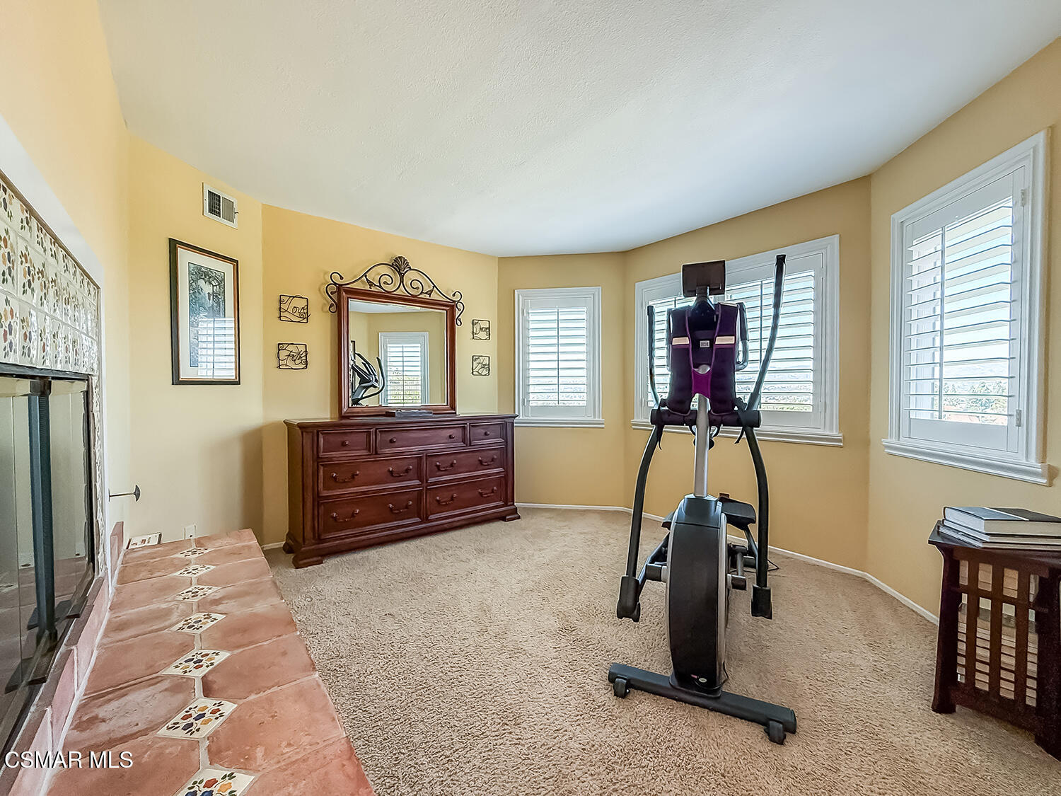 13749 Gunsmoke Road Moorpark, CA 93021 - Photo 47 of 61 a room with furniture a window and a flat screen tv