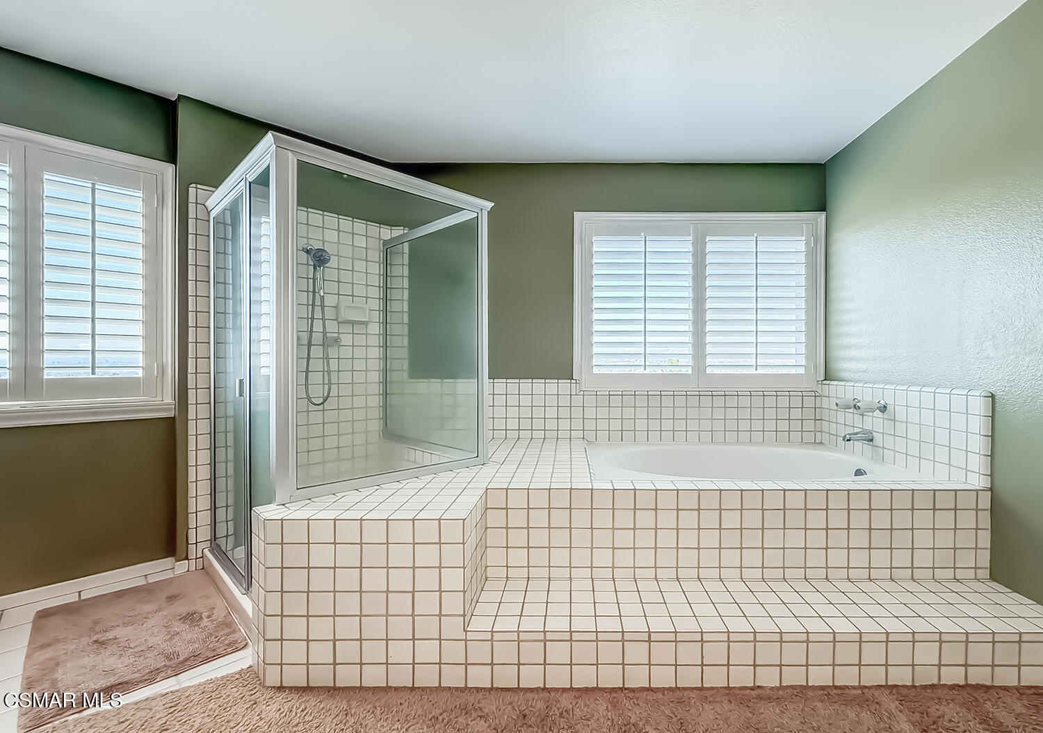 13749 Gunsmoke Road Moorpark, CA 93021 - Photo 50 of 61 a bathroom with a bathtub and shower