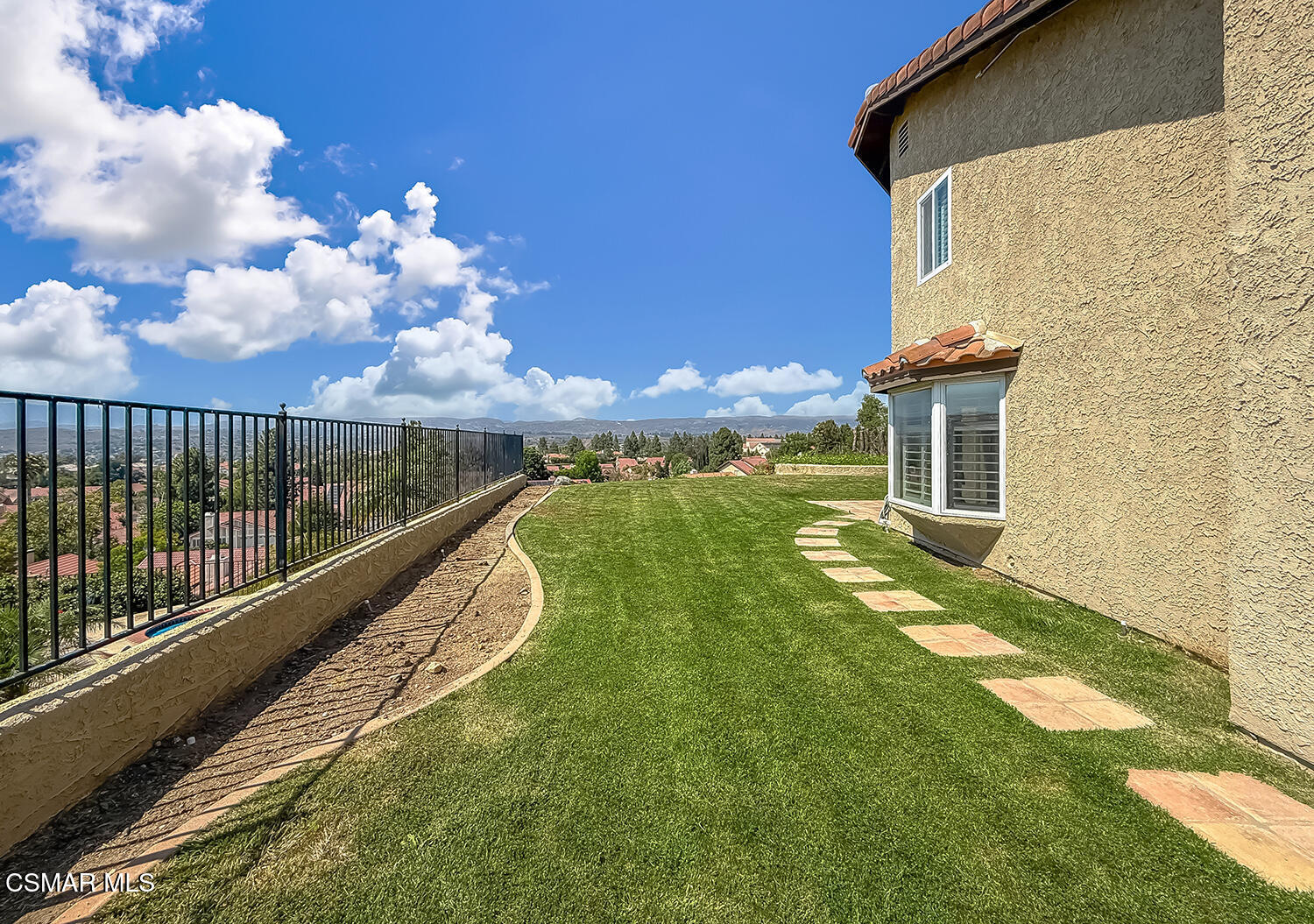 13749 Gunsmoke Road Moorpark, CA 93021 - Photo 53 of 61 a view of a house with backyard