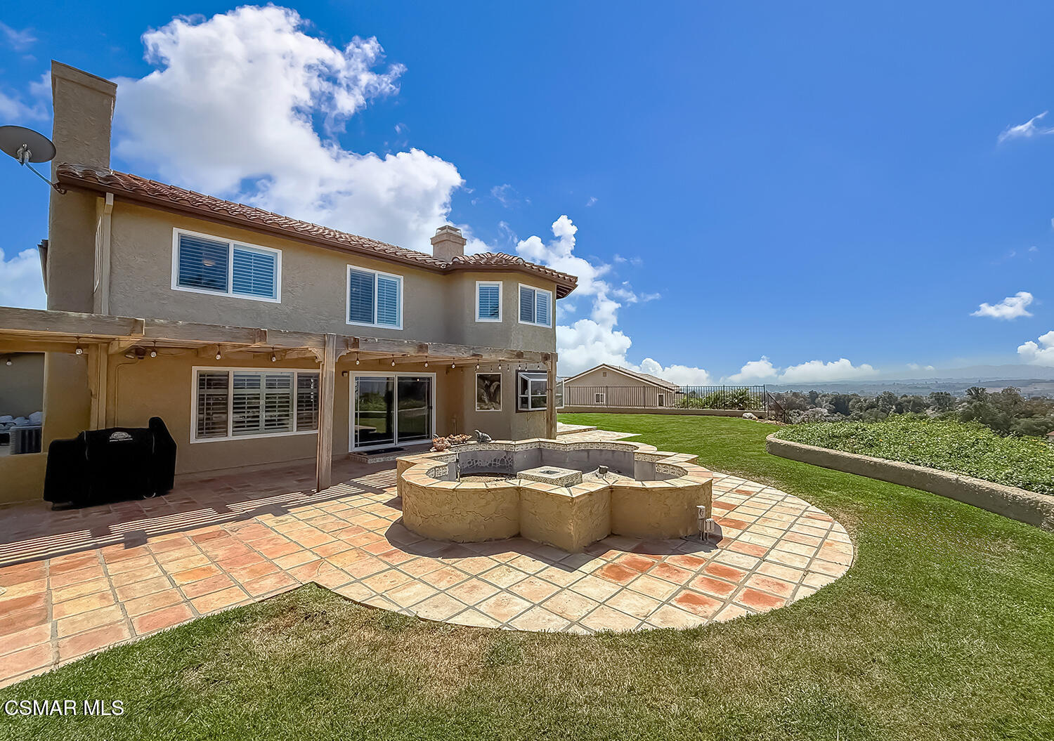 13749 Gunsmoke Road Moorpark, CA 93021 - Photo 60 of 61 a view of a house with a swimming pool
