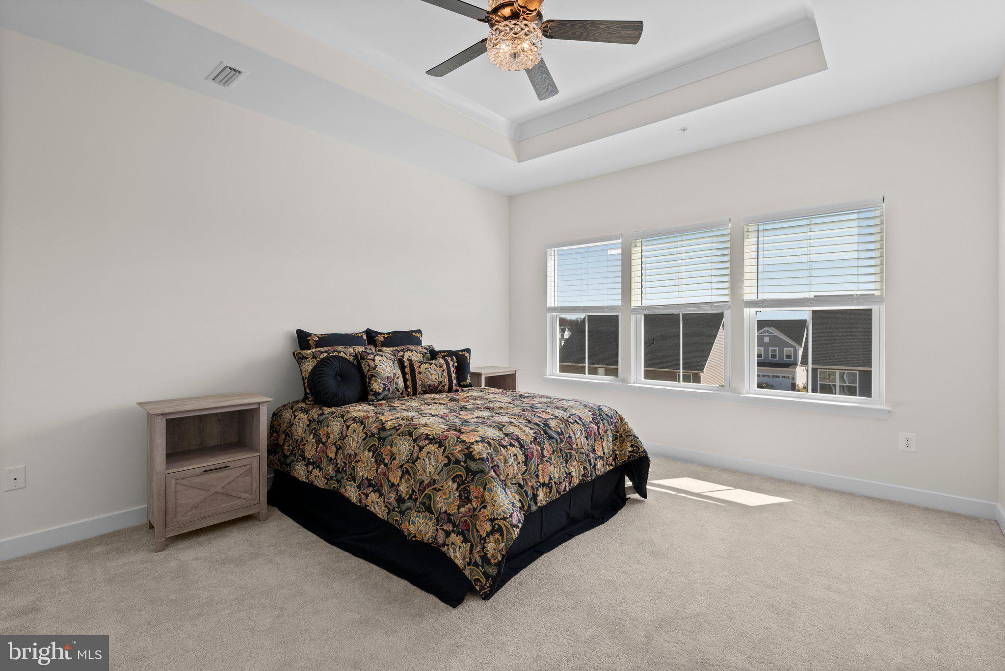 7318 Isabella Road Laurel, MD 20723 - Photo 21 of 39 a bedroom with a bed and a window