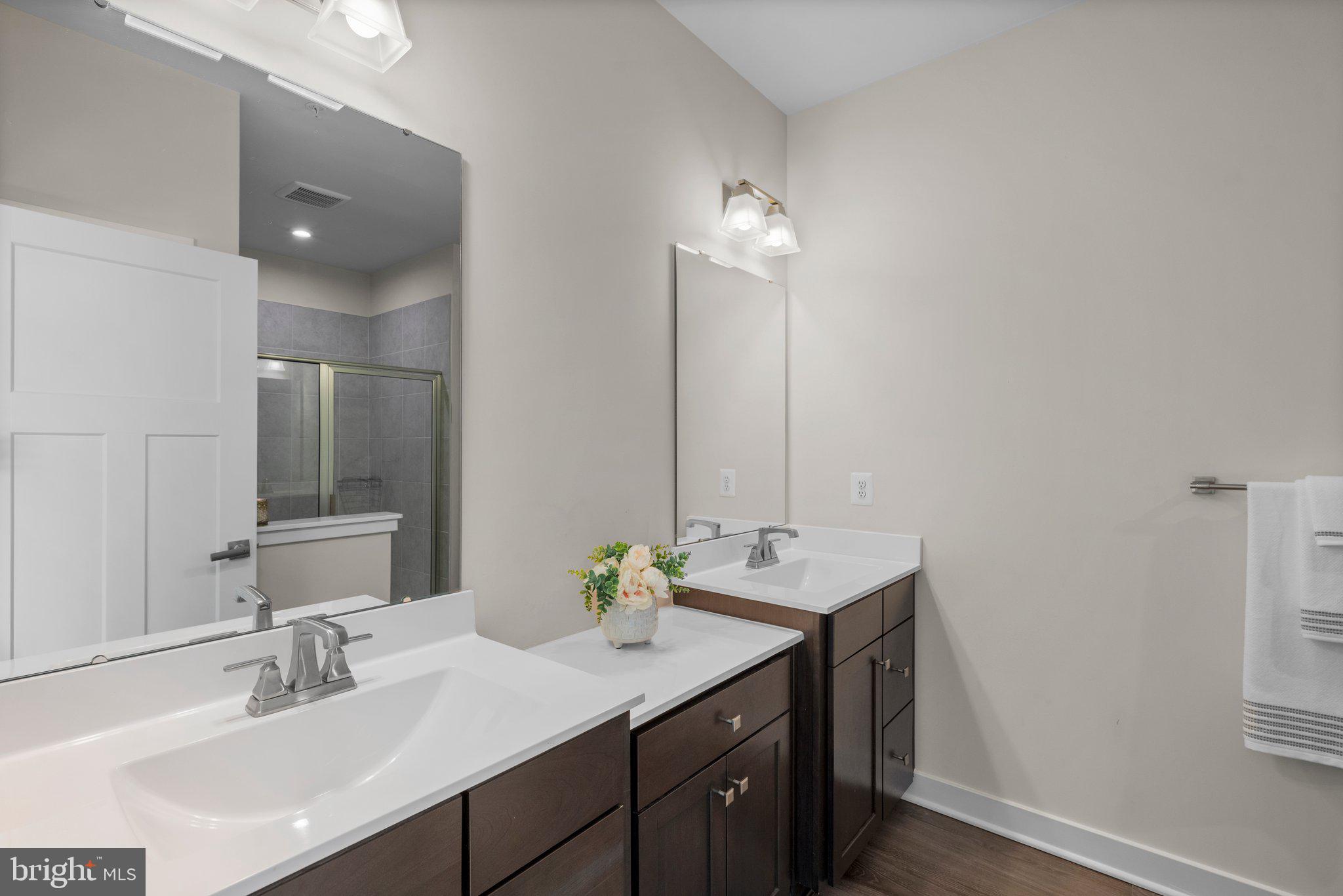 7318 Isabella Road Laurel, MD 20723 - Photo 23 of 39 a bathroom with a sink and a mirror