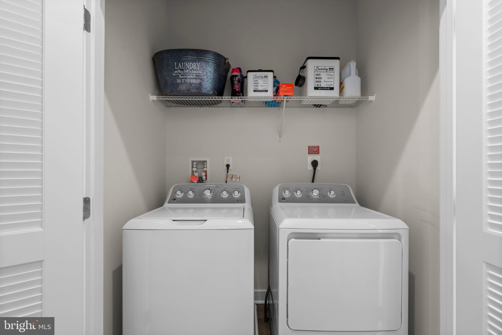 7318 Isabella Road Laurel, MD 20723 - Photo 29 of 39 a utility room with dryer and washer