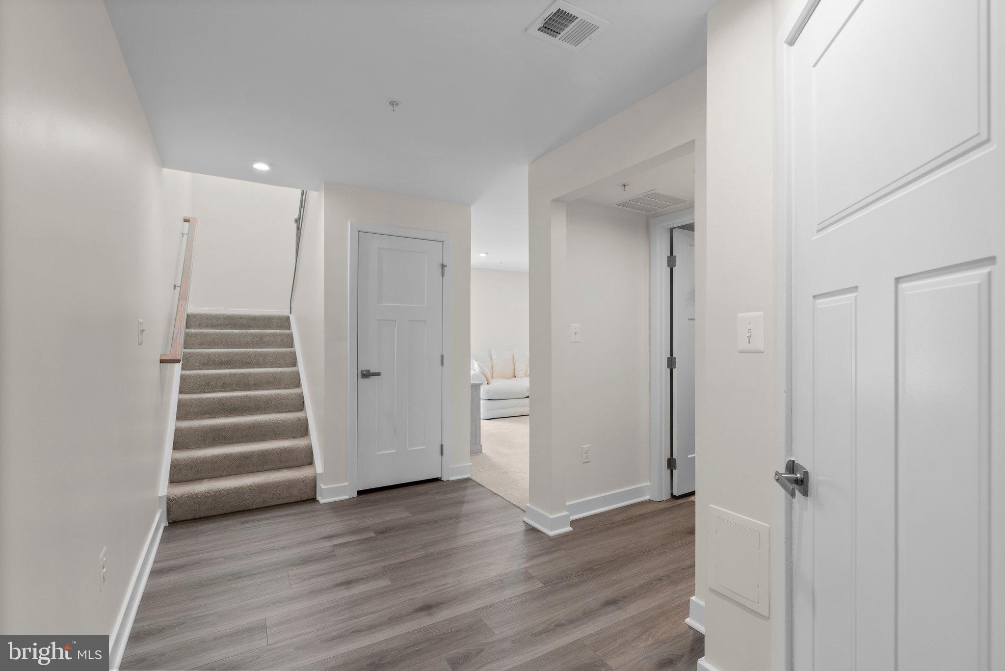 7318 Isabella Road Laurel, MD 20723 - Photo 3 of 39 wooden floor in an empty room