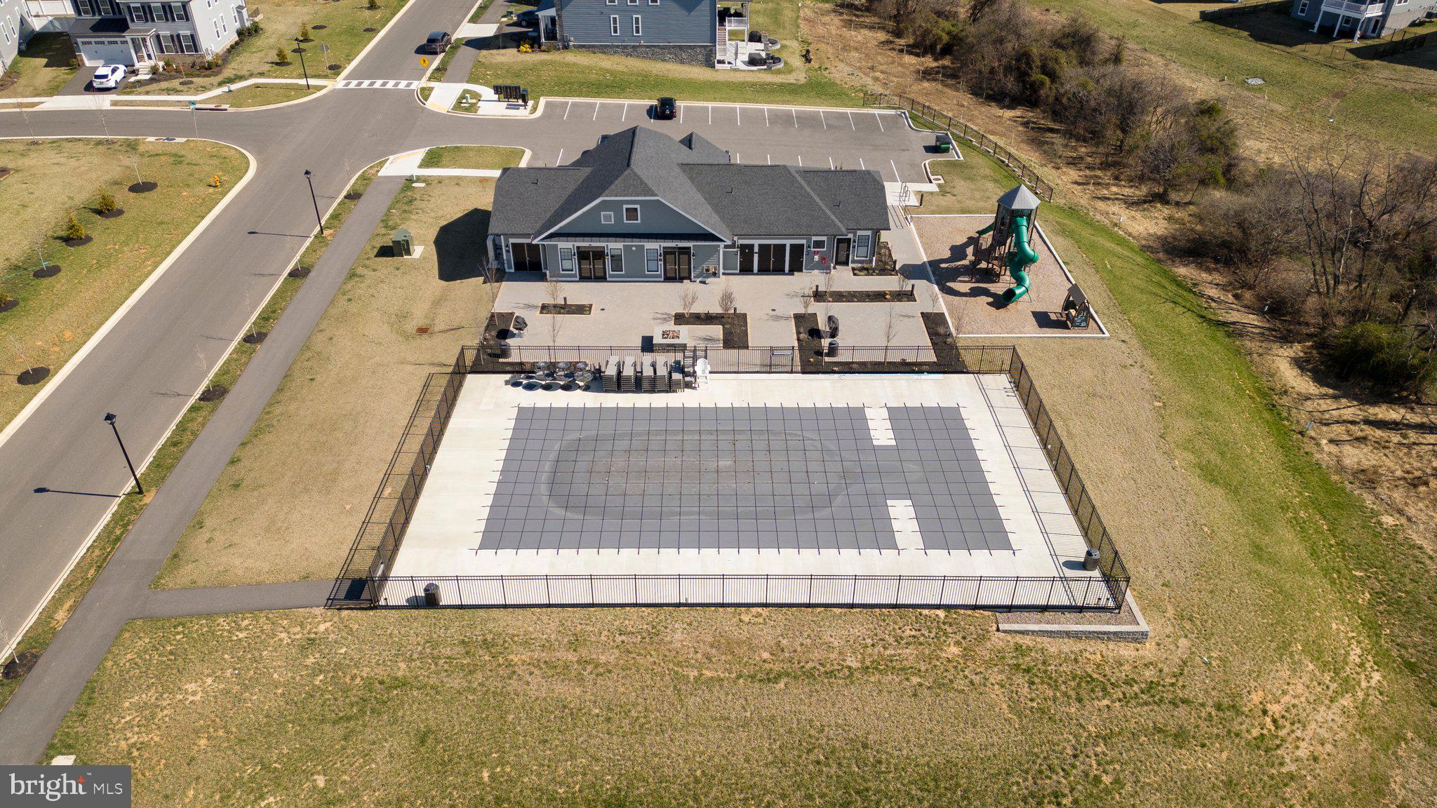 7318 Isabella Road Laurel, MD 20723 - Photo 35 of 39 a view of a swimming pool with a patio