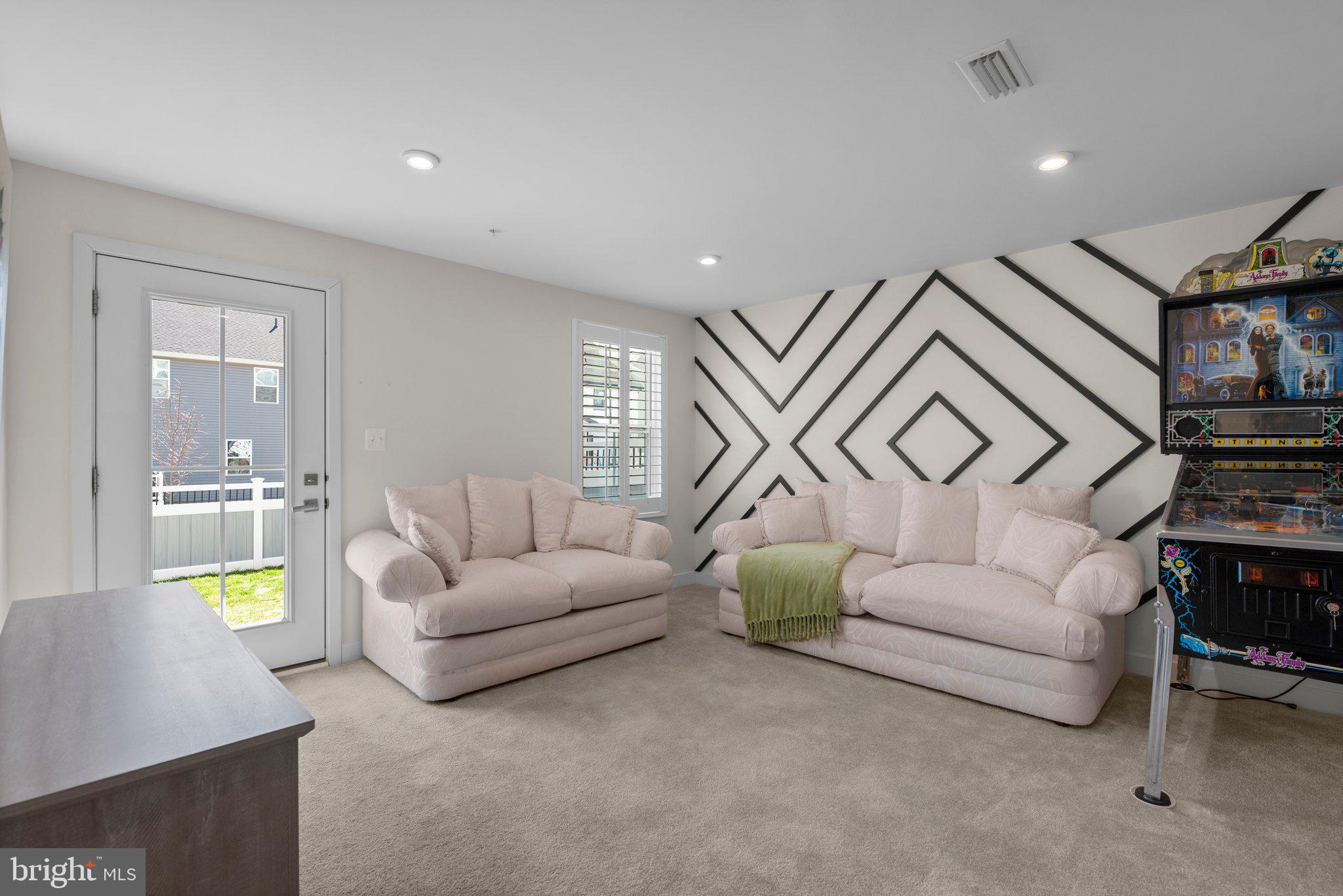 7318 Isabella Road Laurel, MD 20723 - Photo 4 of 39 a living room with furniture and wooden floor