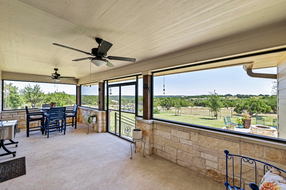 560 Saddle Ridge Drive Bertram, TX 78605 - Photo 17 of 27 a view of a floor to ceiling window and an entrance