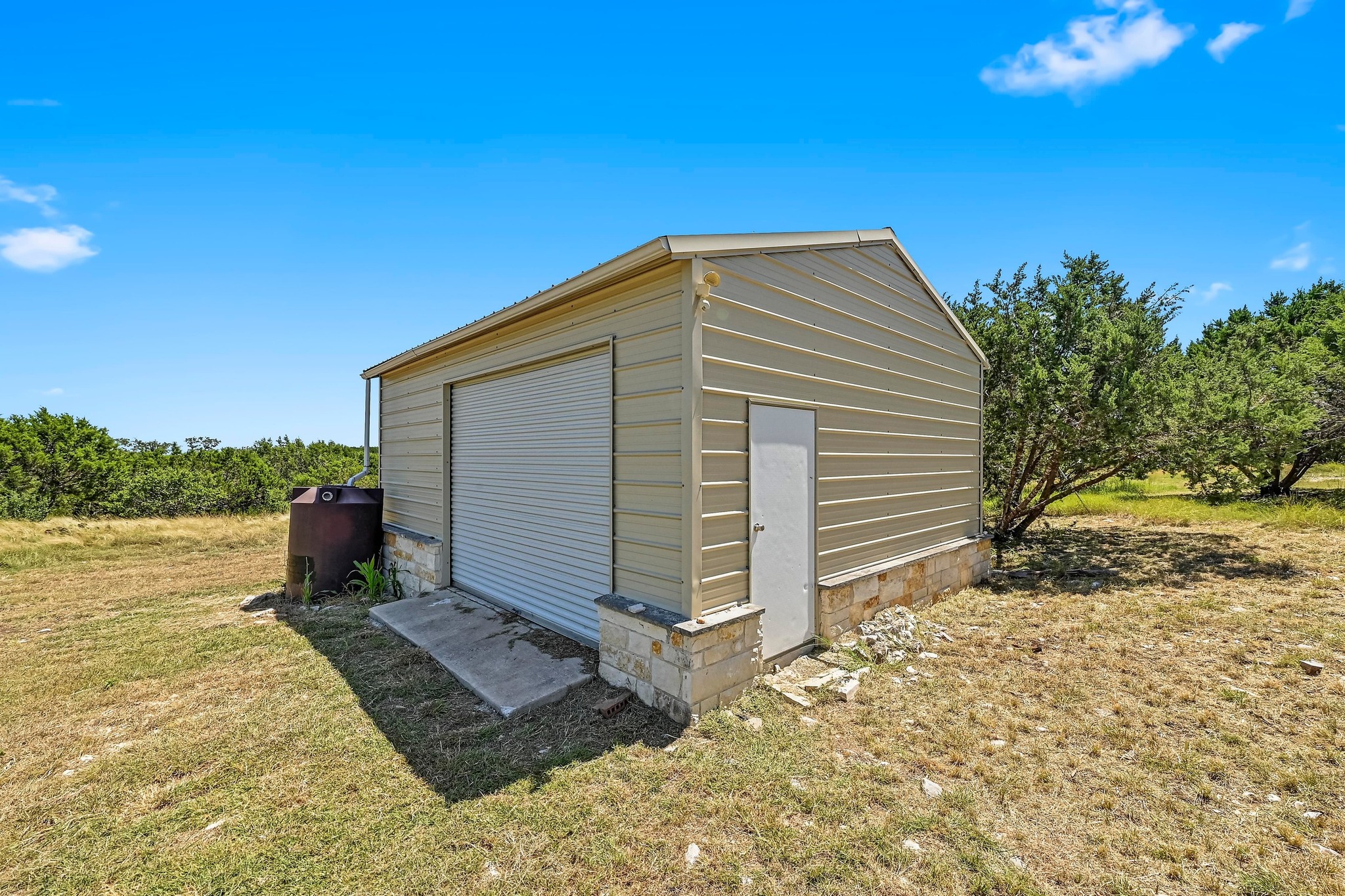 560 Saddle Ridge Drive Bertram, TX 78605 - Photo 21 of 27 a backyard of a house