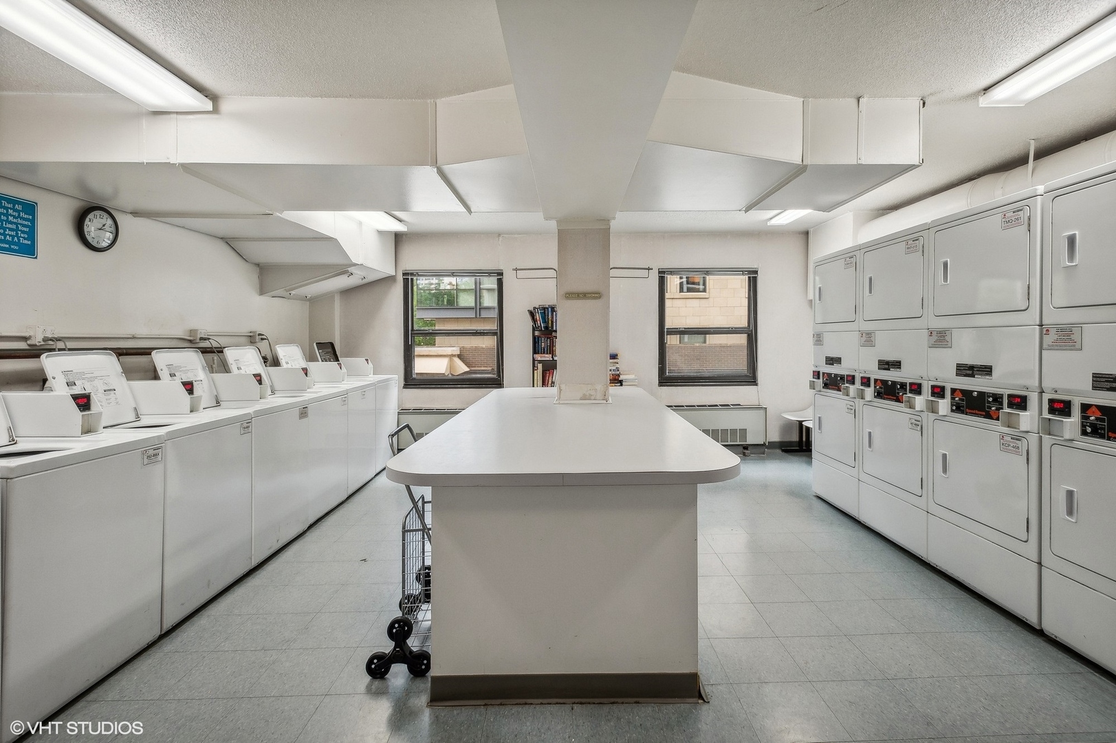 1313 North Ritchie Court, Unit 2106 Chicago, IL 60610 - Photo 12 of 12 a kitchen with counter top space sink stove and cabinets