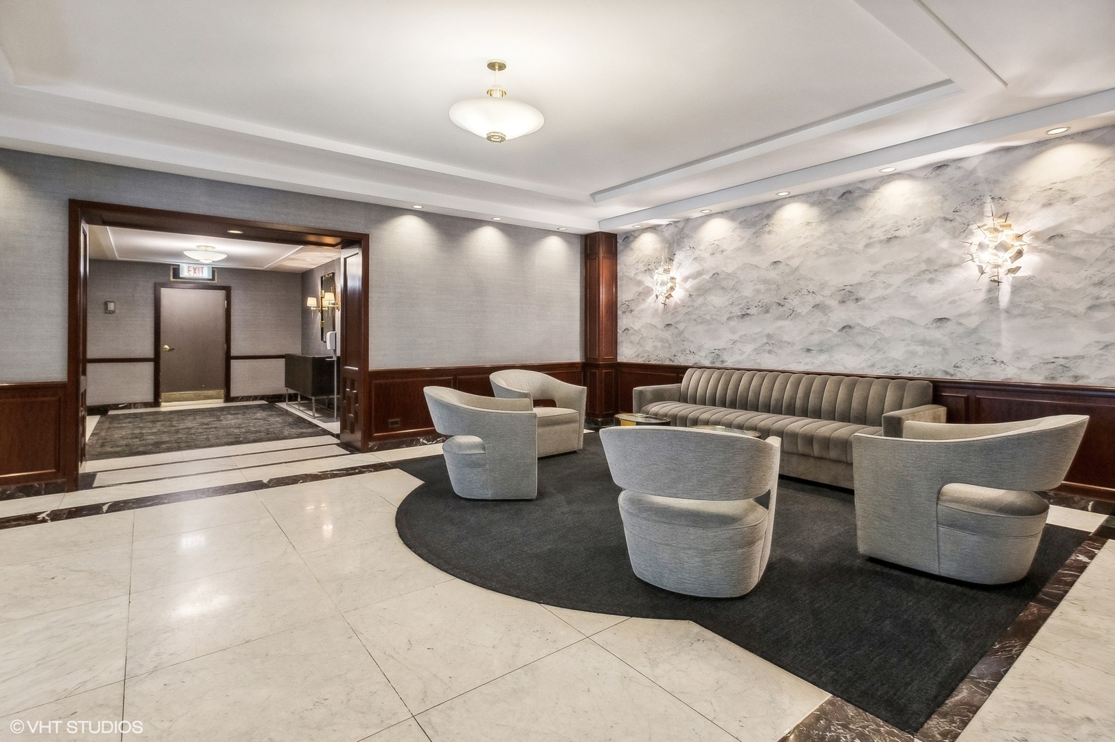 1313 North Ritchie Court, Unit 2106 Chicago, IL 60610 - Photo 2 of 12 a living room with furniture and a large window