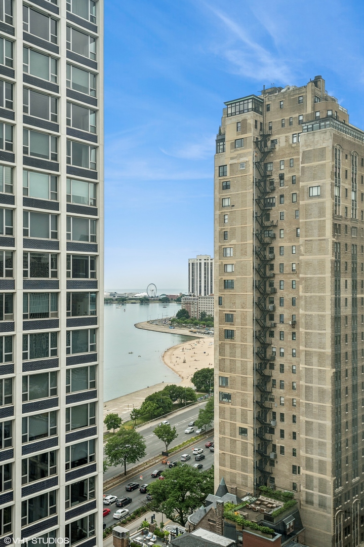 1313 North Ritchie Court, Unit 2106 Chicago, IL 60610 - Photo 5 of 12 a view of a building with a yard