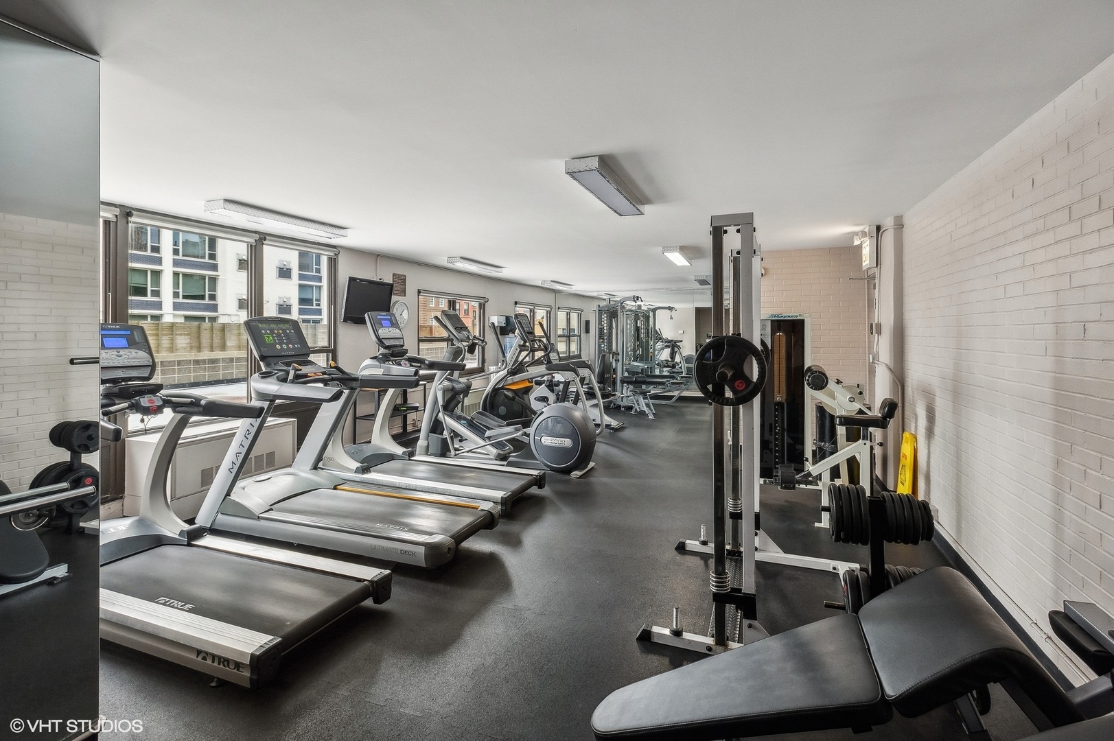 1313 North Ritchie Court, Unit 2106 Chicago, IL 60610 - Photo 10 of 12 a view of a room with gym equipment