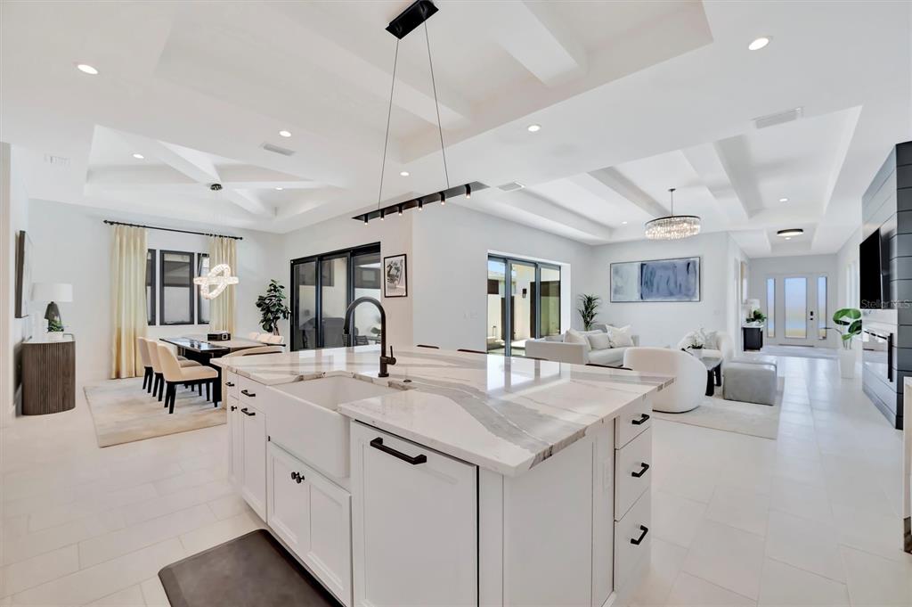 5939 Redbay Boulevard Bradenton, FL 34210 - Photo 15 of 61 a view of living room filled with furniture and wooden floor