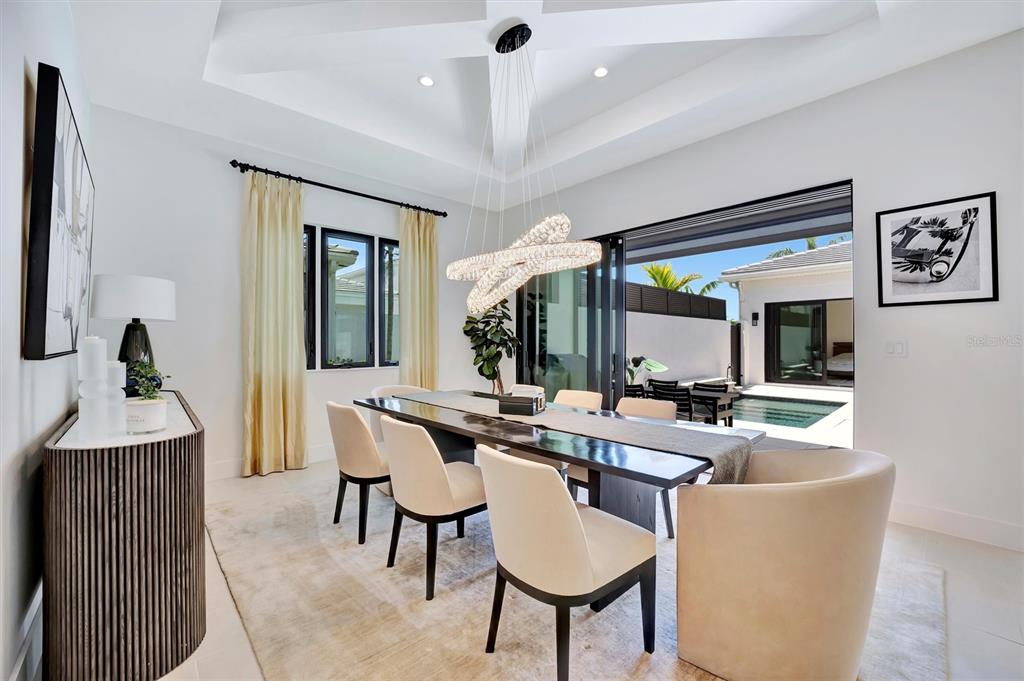 5939 Redbay Boulevard Bradenton, FL 34210 - Photo 23 of 61 a view of a dining room with furniture window and outside view