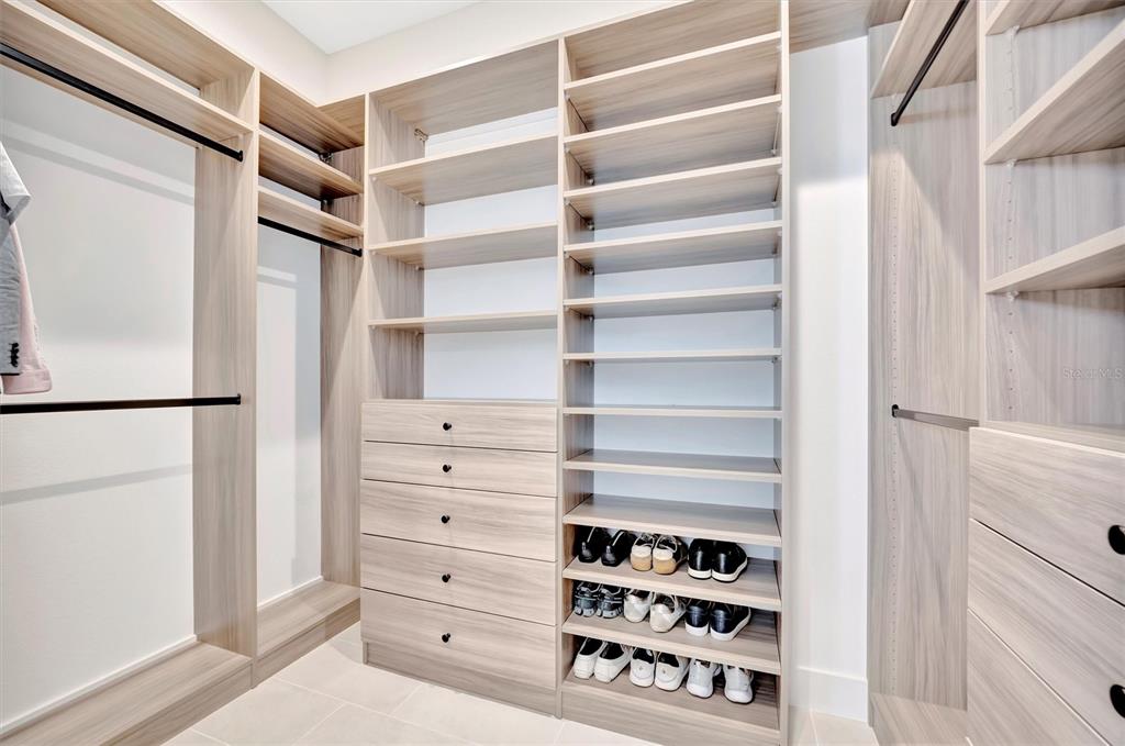 5939 Redbay Boulevard Bradenton, FL 34210 - Photo 42 of 61 a view of walk in closet with empty racks