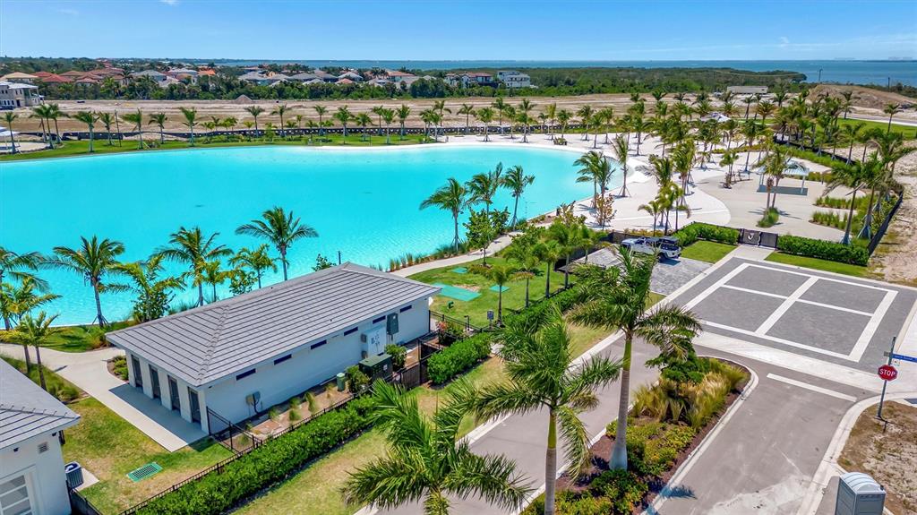 5939 Redbay Boulevard Bradenton, FL 34210 - Photo 55 of 61 an aerial view of a house with a lake view