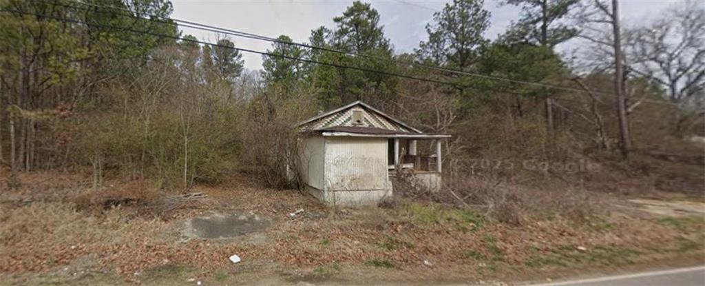980 Morrisville Road Anniston, AL 36201 - Photo 4 of 4 a view of a small house with a street