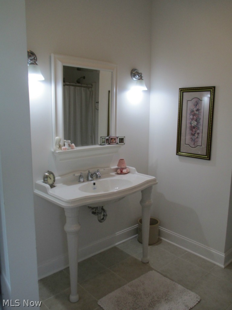 3429 Plymouth Ridge Road Kingsville, OH 44048 - Photo 18 of 25 Wide base Pedastal Sink in the master bath.