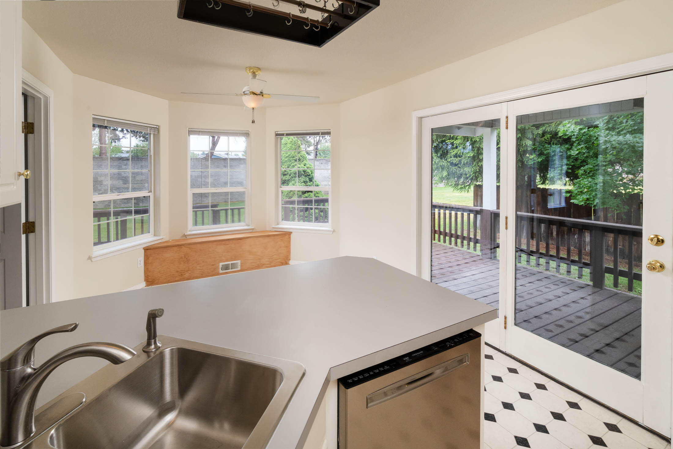 3389 Northeast Stonebrook Loop Bend, OR 97701 - Photo 8 of 27 Access to southern rear deck off kitchen.