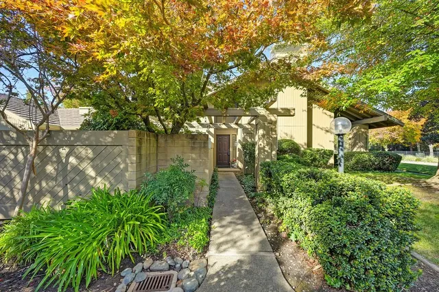 a backyard of a house with lots of green space