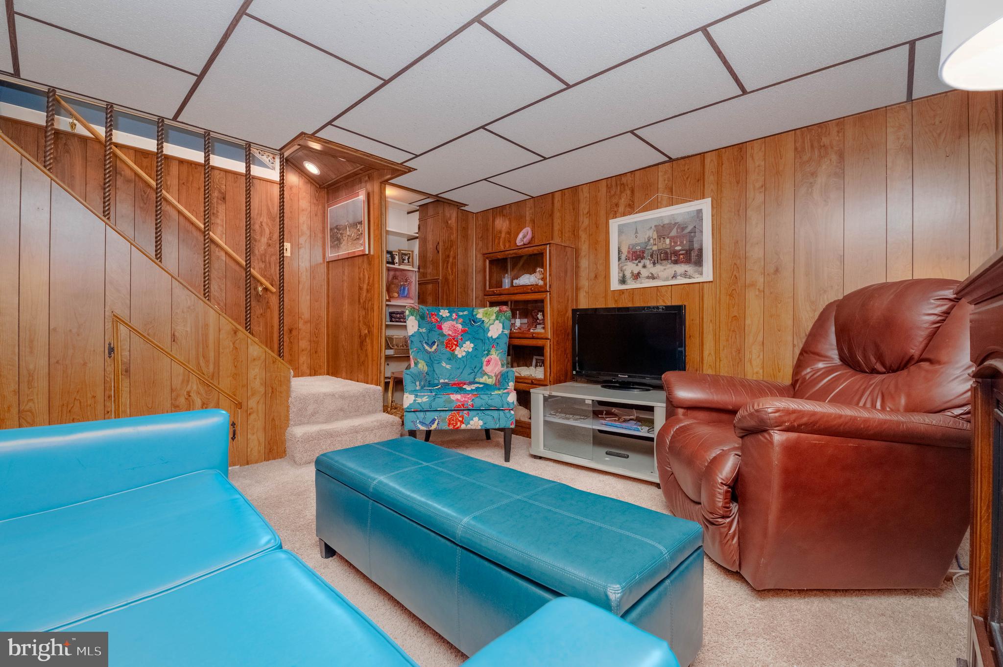 1930 Stanhope Road Baltimore, MD 21222 - Photo 22 of 32 a living room with furniture and a flat screen tv