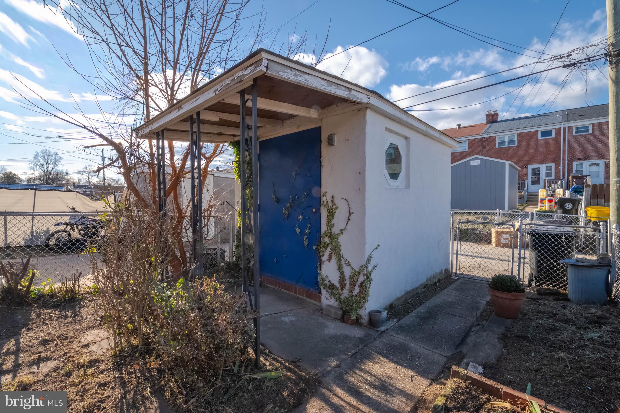1930 Stanhope Road Baltimore, MD 21222 - Photo 28 of 32 a front view of a house with a yard