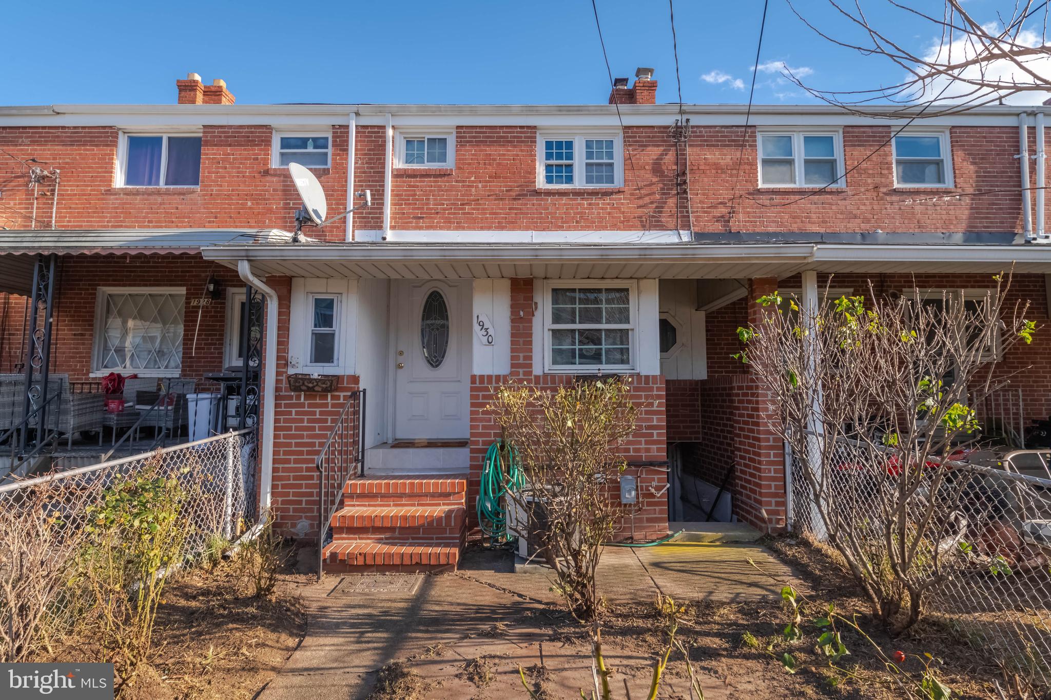 1930 Stanhope Road Baltimore, MD 21222 - Photo 29 of 32 a front view of a house with a porch