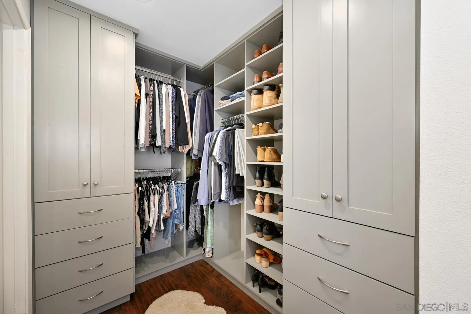 1270 Cleveland Avenue, Unit F246 San Diego, CA 92103 - Photo 13 of 23 a view of walk in closet with clothes and shoes