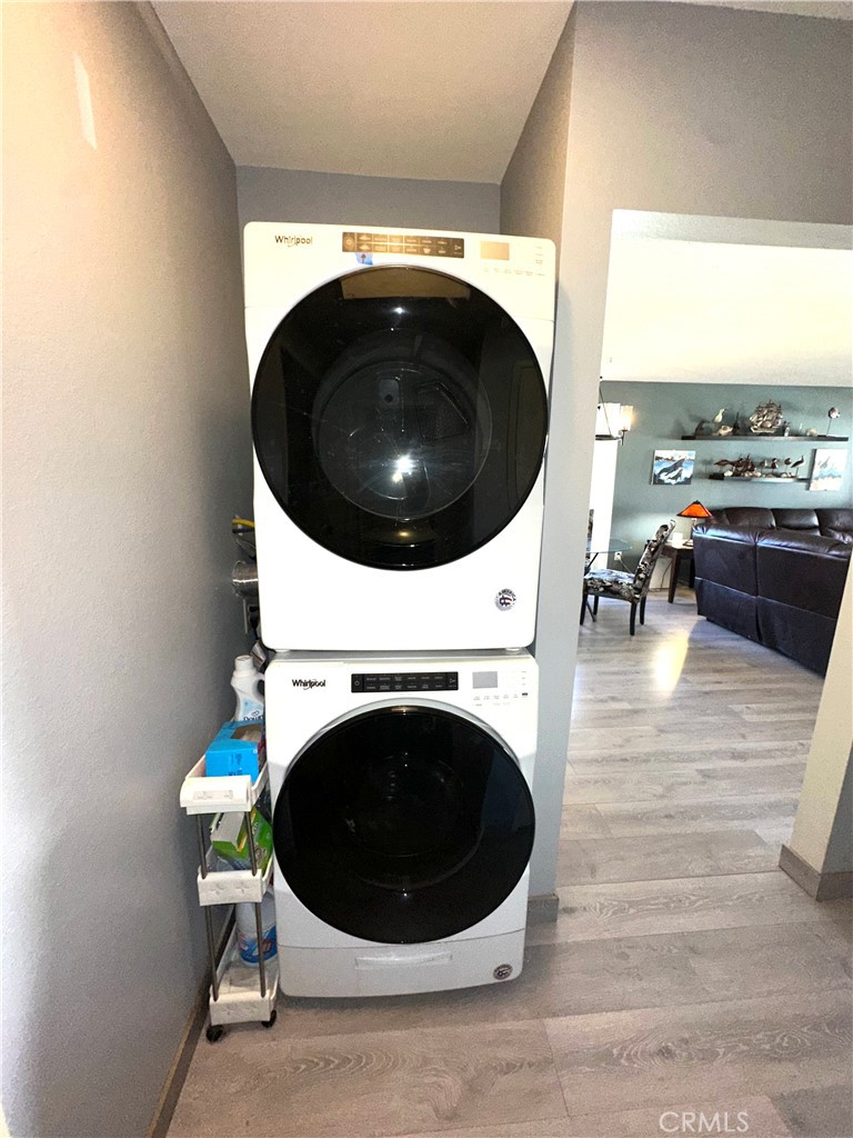 6612 Southampton Drive Cypress, CA 90630 - Photo 12 of 27 a living room with a washer and dryer