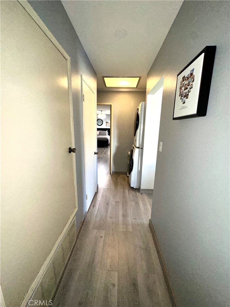 6612 Southampton Drive Cypress, CA 90630 - Photo 13 of 27 a view of a hallway with wooden floor