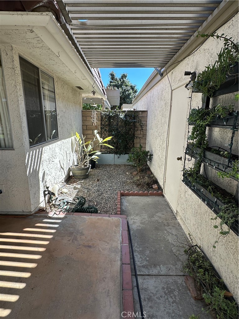 6612 Southampton Drive Cypress, CA 90630 - Photo 19 of 27 a view of a porch with furniture