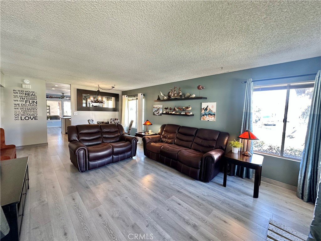 6612 Southampton Drive Cypress, CA 90630 - Photo 2 of 27 a living room with furniture and a wooden floor