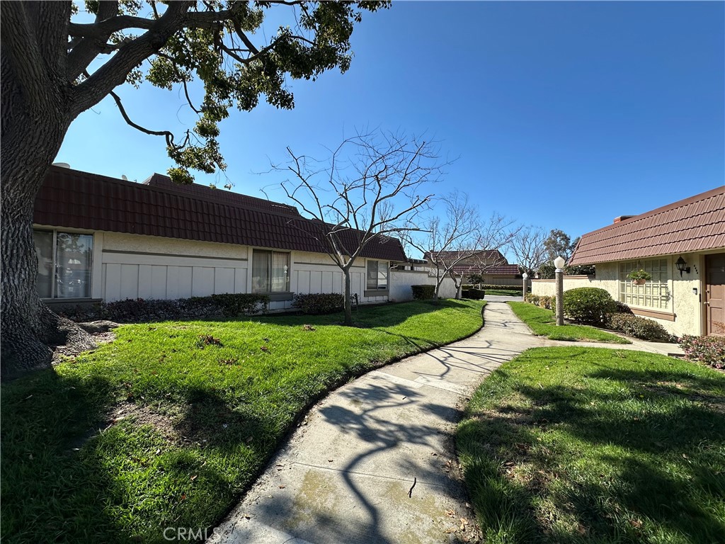 6612 Southampton Drive Cypress, CA 90630 - Photo 27 of 27 a view of a house with a yard