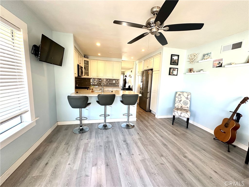 6612 Southampton Drive Cypress, CA 90630 - Photo 6 of 27 a living room with furniture and a flat screen tv