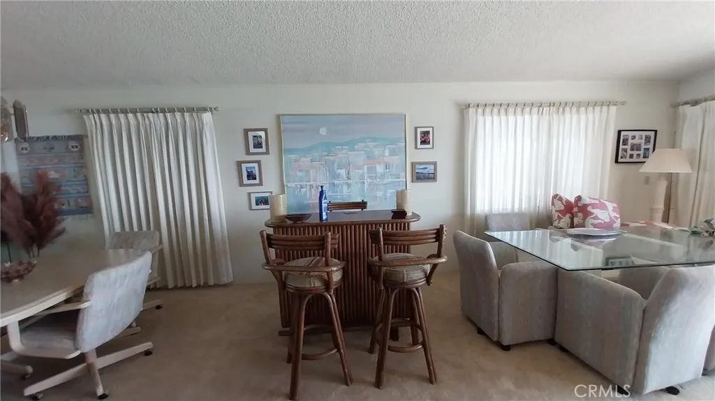 205 Thunderbird Lane, Unit 2 Needles, CA 92363 - Photo 48 of 71 a view of a dining room with furniture