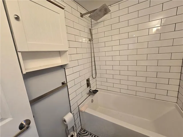 a bathroom with a bathtub