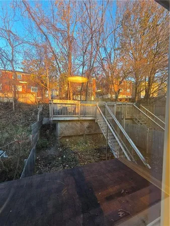 a view of backyard with green space