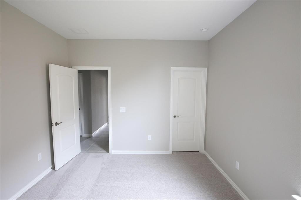 15142 Rosario Road Frisco, TX 75035 - Photo 17 of 21 Neutral gray wall paint complementing gray carpeting