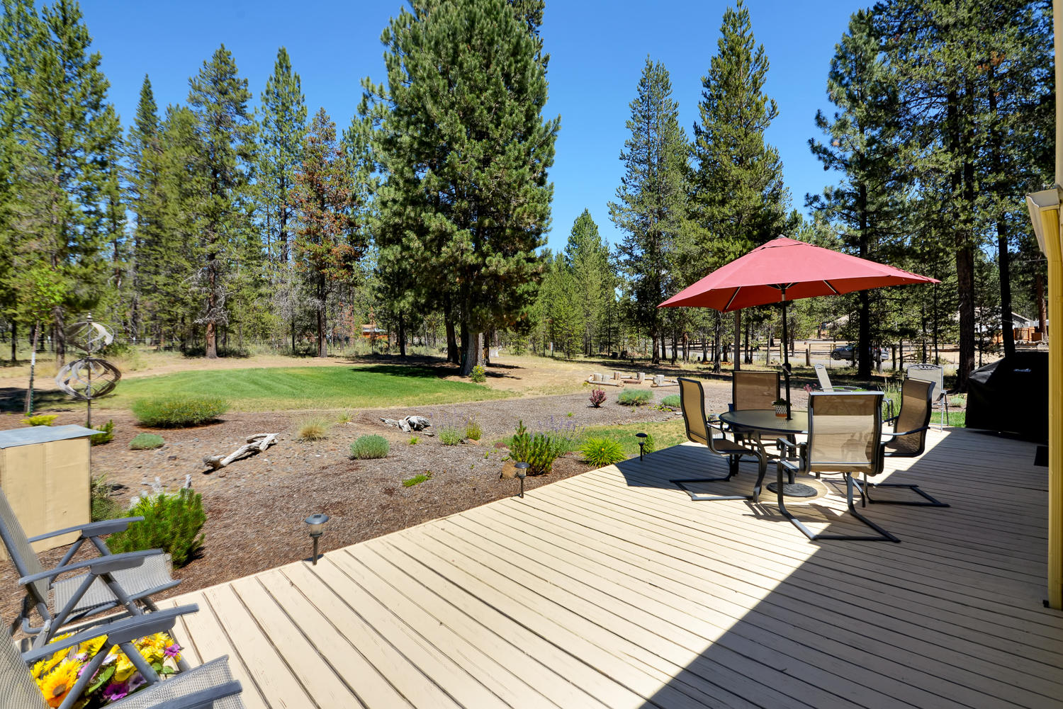 52311 Ammon Road La Pine, OR 97739 - Photo 32 of 39 a view of a backyard with sitting area