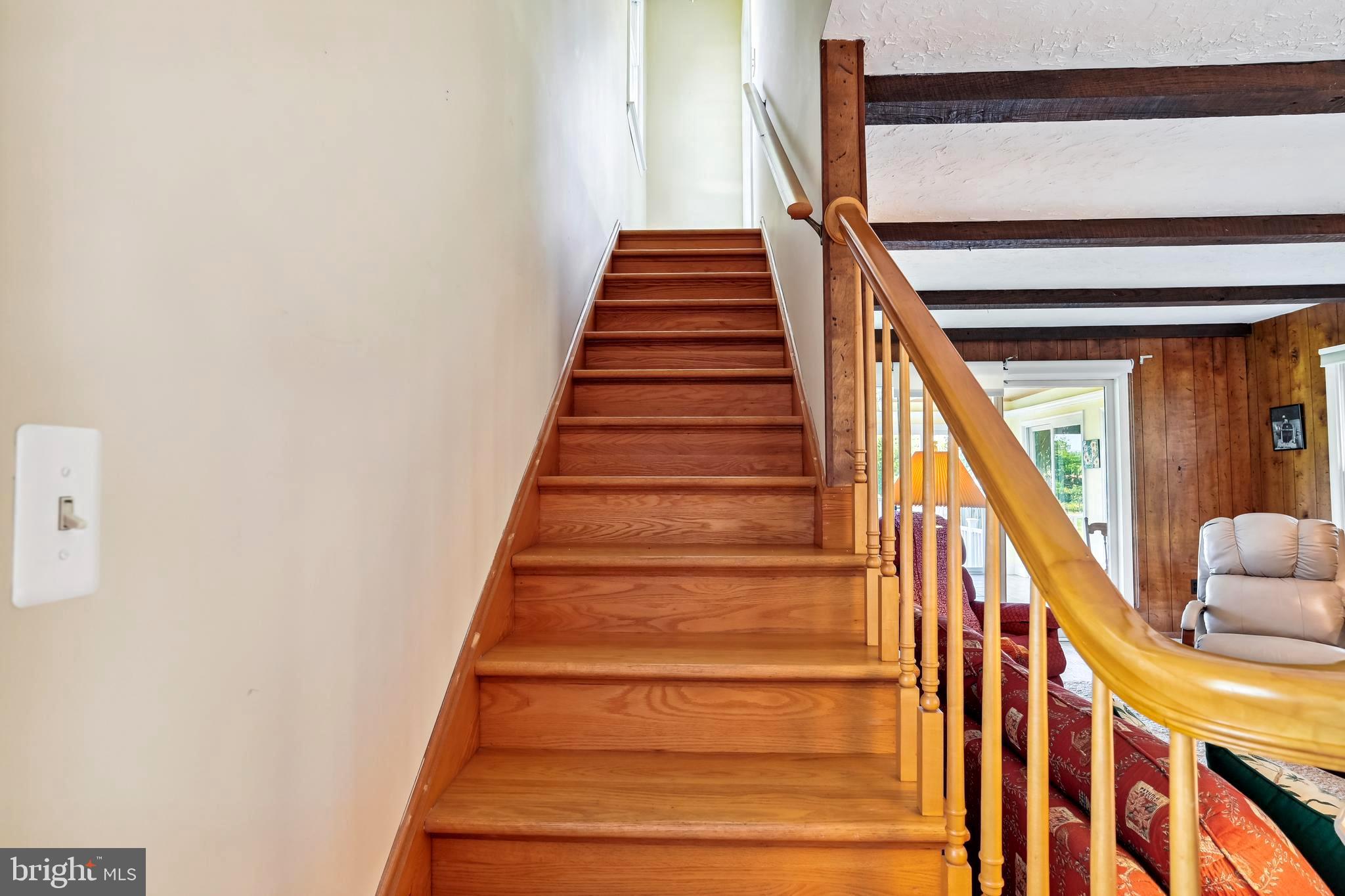 4475 Muddy Creek Road Harwood, MD 20776 - Photo 38 of 59 Two Hardwood Staircases to Upper Level