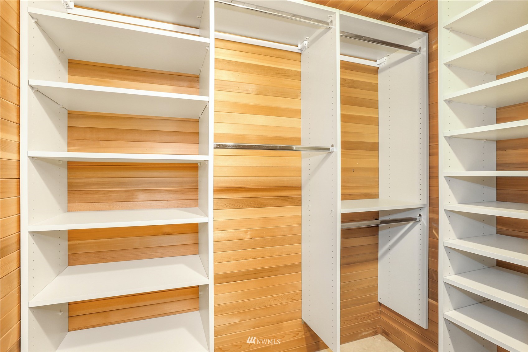 1301 Spring Street, Unit 18H Seattle, WA 98104 - Photo 24 of 38 a view of walk in closet with empty racks