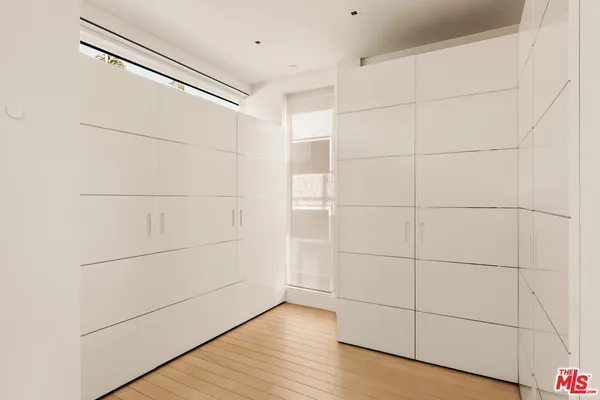 a bathroom with a dryer and a shower