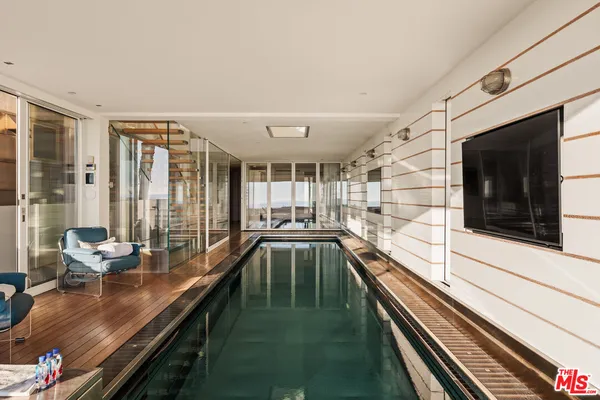 a view of a balcony with lake view and ocean view