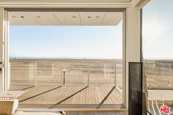 a view of a hallway with washer and dryer