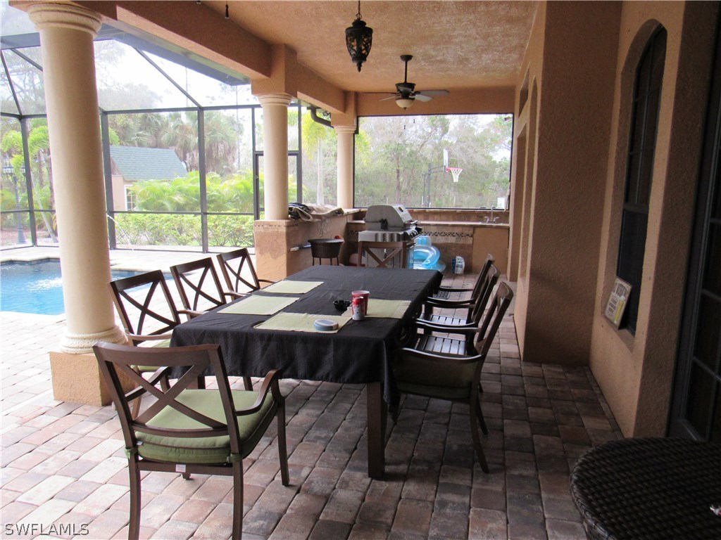 31031 Oil Well Road Punta Gorda, FL 33955 - Photo 18 of 22 a view of a dining room with furniture window and outside view