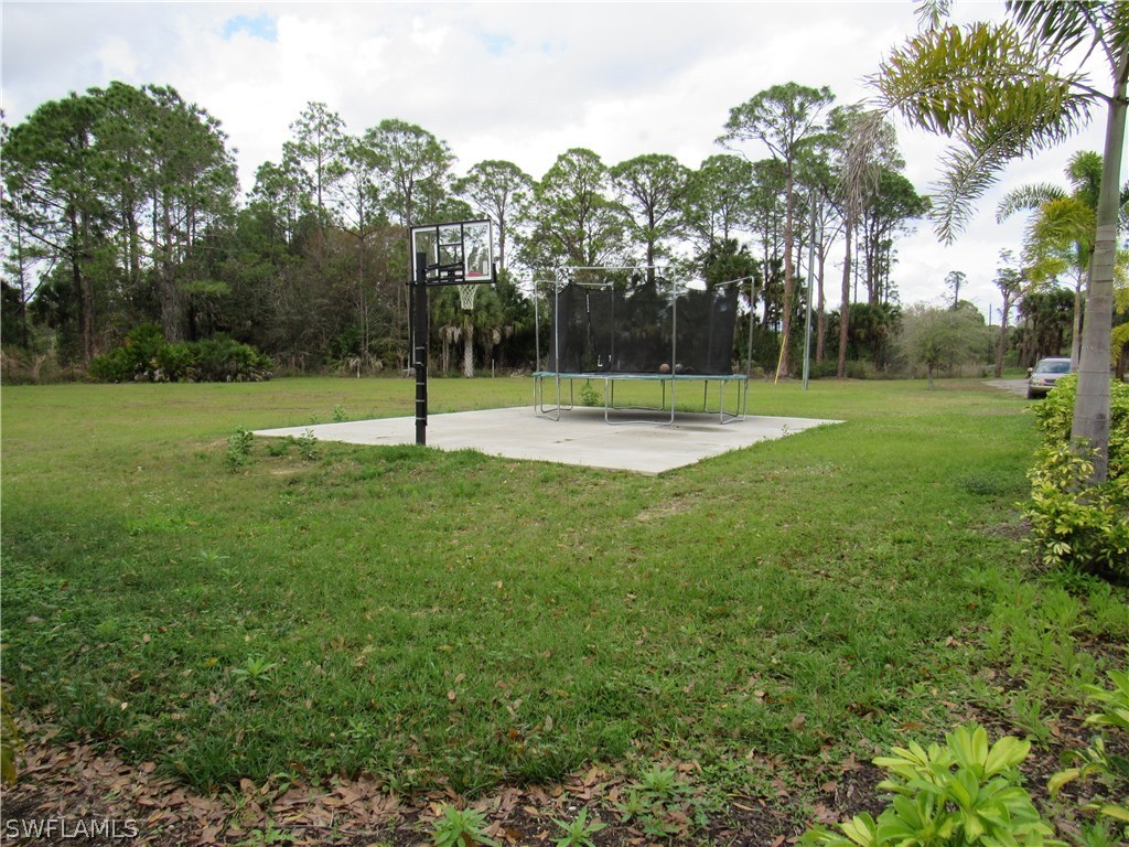 31031 Oil Well Road Punta Gorda, FL 33955 - Photo 21 of 22 a view of a park with large trees