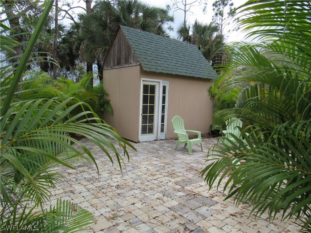 31031 Oil Well Road Punta Gorda, FL 33955 - Photo 22 of 22 a view of a house with a patio