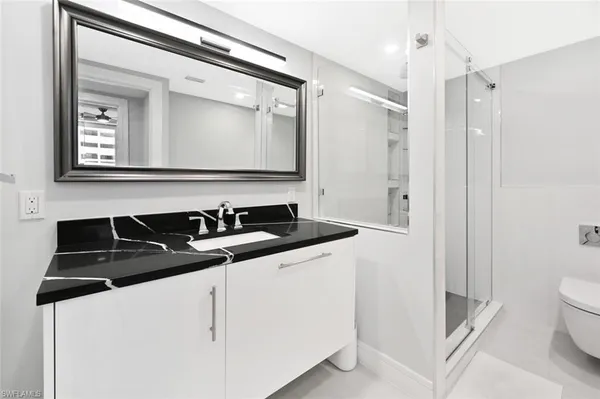 a close view of a sink and a mirror