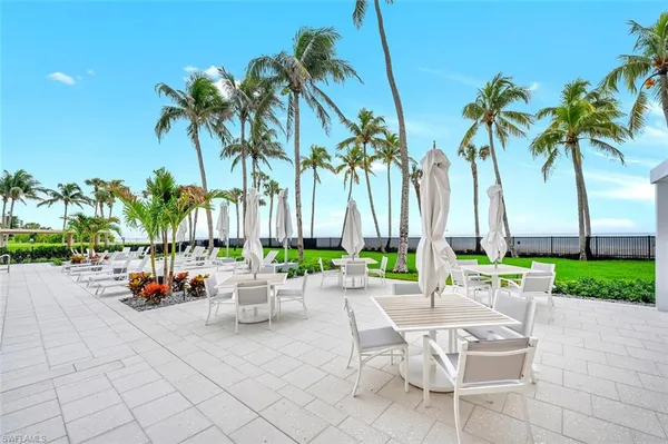 a view of an outdoor dining space with furniture