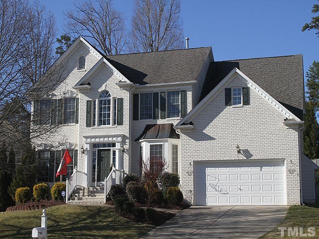 1508 Wood Spring Court Raleigh, NC 27614 - Photo 1 of 25 a front view of a house with a yard